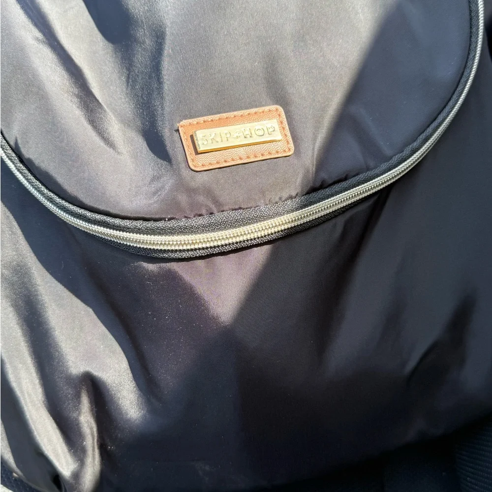 Skip Hop Black Backpack with Sleek Design and Durable Material